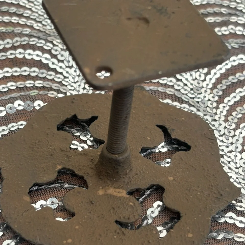 Antique cast iron curtain accents